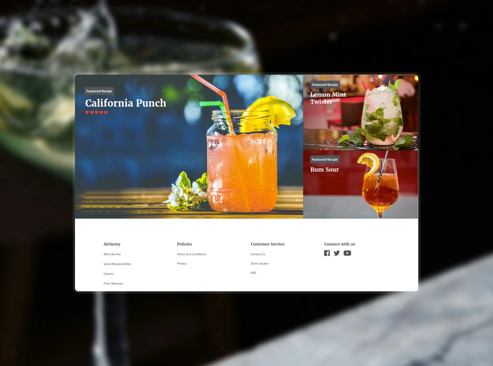 Alchemy site section with featured cocktail recipes and footer links